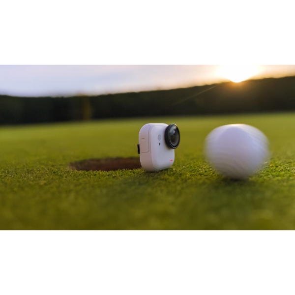 Insta360 GO Ultra 4K camera in white, worn hands-free in use - DokkanTech