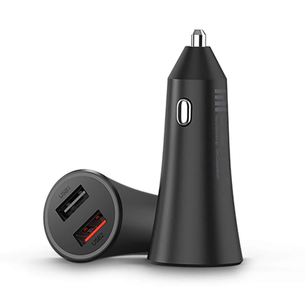 A black car cigarette lighter charger with two USB ports, shown standing upright with one port facing forward and the other lying down on its side. The brand name 'LUMIPOWER' is visible on the side of the charger.