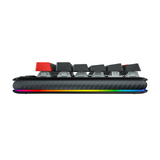 Logitech G517 Lightspeed TKLWireless A close-up side view of a mechanical keyboard featuring a black and gray textured body, black keycaps, red side switches, and a vibrant RGB rainbow light strip along the bottom edge.