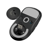A black Logitech PRO X wireless receiver and its matching circular black cap are shown on a clean white background. The receiver features a gray backplate, a USB connector, and a textured blue accent button.