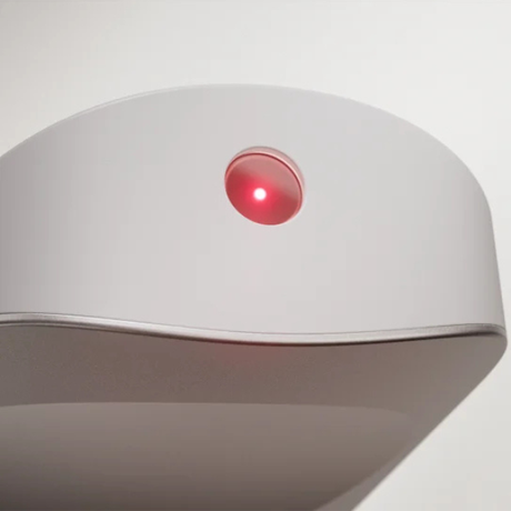 Close-up of sand Spotlight 2 laser pointer