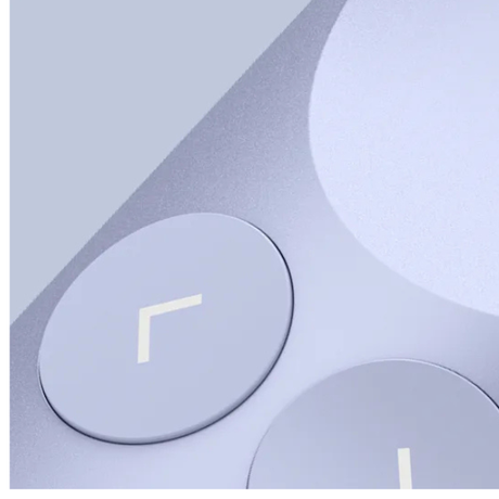 Close-up of light lilac Spotlight 2 slide navigation buttons