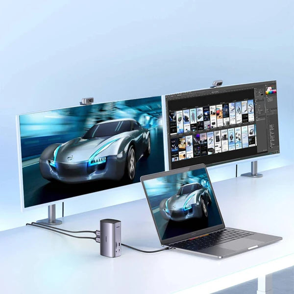 Laptop with a car design on screen, flanked by two monitors displaying similar content on a light blue background.