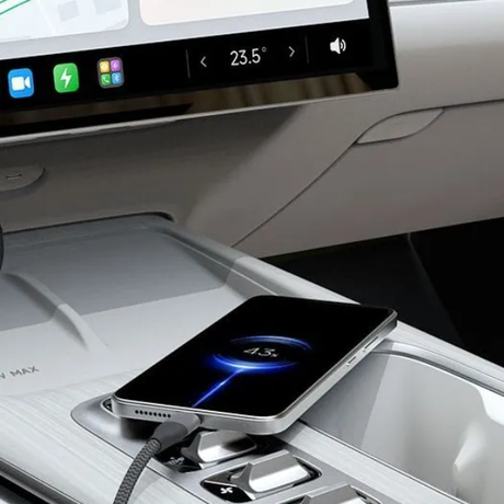 Xiaomi USB-C cable connected to a phone inside a car