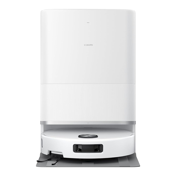 A white Xiaomi robotic vacuum cleaner docked at its matching white charging station, shown against a solid white background.