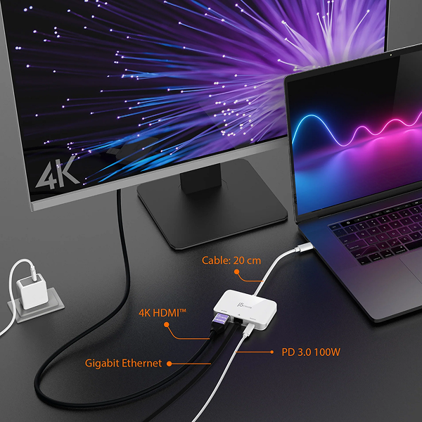 j5create JCA351USB - Cto 4K HDMI Ethernet Adapter - DokkanTech Computer monitor and laptop with a USB-C hub on a dark surface