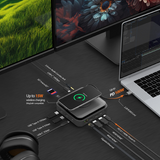 Multi-port USB-C hub with laptop, monitor, and mouse on a desk