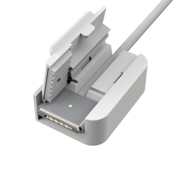 Close-up of a gray electronic device with a cable on a white background