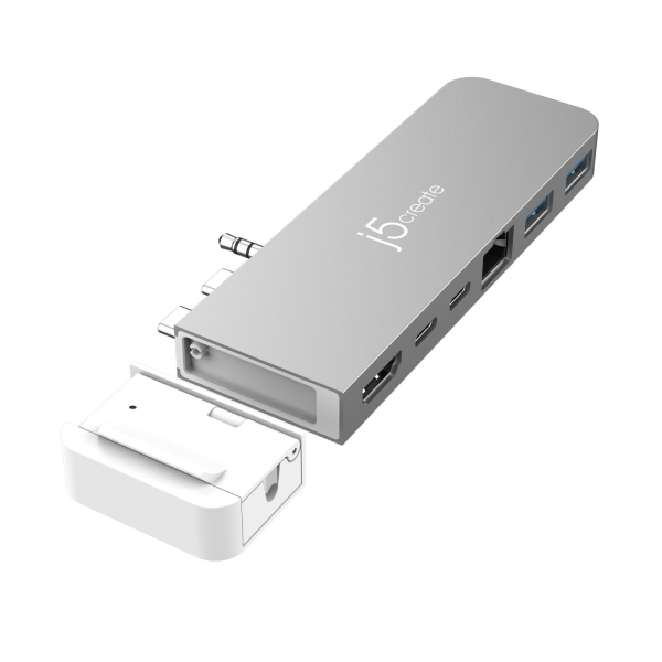 Silver USB hub with multiple ports on a white background