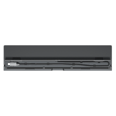 A dark gray rectangular electronic device with a long cable and connector visible inside, shown against a plain white background.