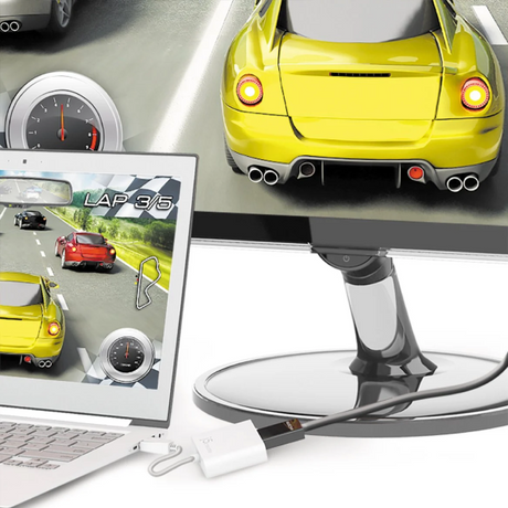 j5create JDA154 DisplayPort to HDMI Adapter Laptop with racing game on screen, yellow car, and computer monitor displaying racing game.