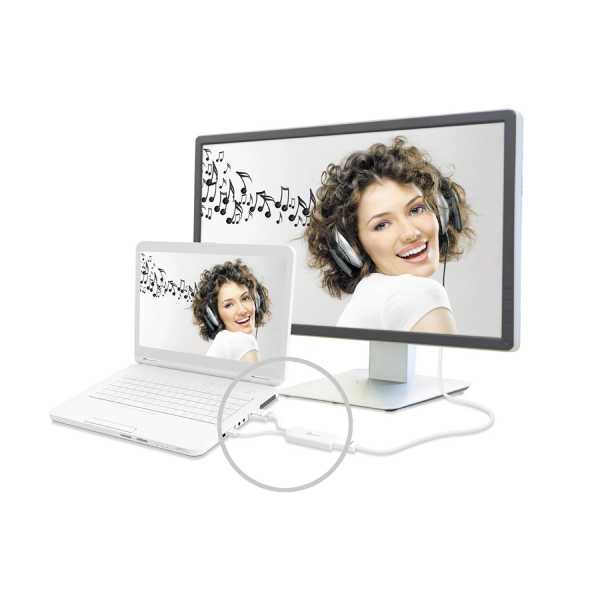 Two computer monitors displaying a woman with headphones on, with a laptop and glasses in front.