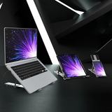 A silver laptop, tablet, and smartphone arranged on a dark tabletop with angled black geometric background panels. The screens all display a purple and blue burst wallpaper.