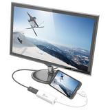 j5create JUA165C Android USB to HDMI Display Adapter - DokkanTech Monitor displaying a skiing scene with a smartphone mirroring the screen on a white background