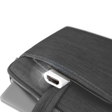 Close-up of a gray laptop sleeve with an HDMI port on a white background