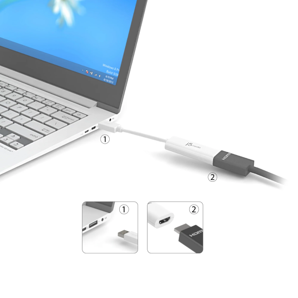 Laptop with a USB cable connected, showing close-up details of the cable ends.