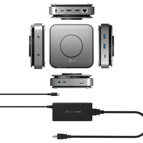 A 15-inch JVC Micro mini PC shown from multiple angles, including top-down, side, and front views, along with its power adapter and cables, all on a solid white background.
