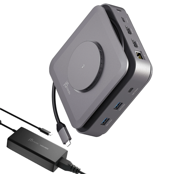 Gray USB hub with multiple ports and a power adapter on a white background