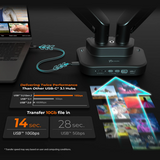 USB-C hub with laptop and monitor setup on a dark surface, highlighting transfer speeds and performance.