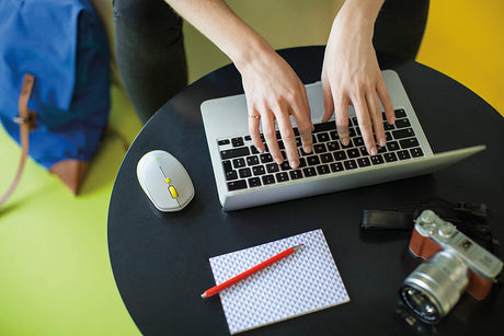Logitech M535 Bluetooth wireless mouse – on desk lifestyle